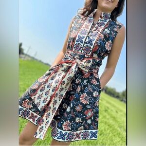 Sue Sartor sleeveless flounce mini dress. Navy floral.